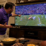LSU Fan Introduces Seven-Year-Old Son To Sacred Family Tradition Of Complaining About Offensive Coordinator